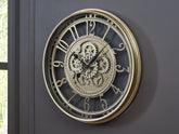 Floridian Furniture - Ashley Furniture - Gilover Wall Decor - Wall Clock / Champagne Finish - A8010386