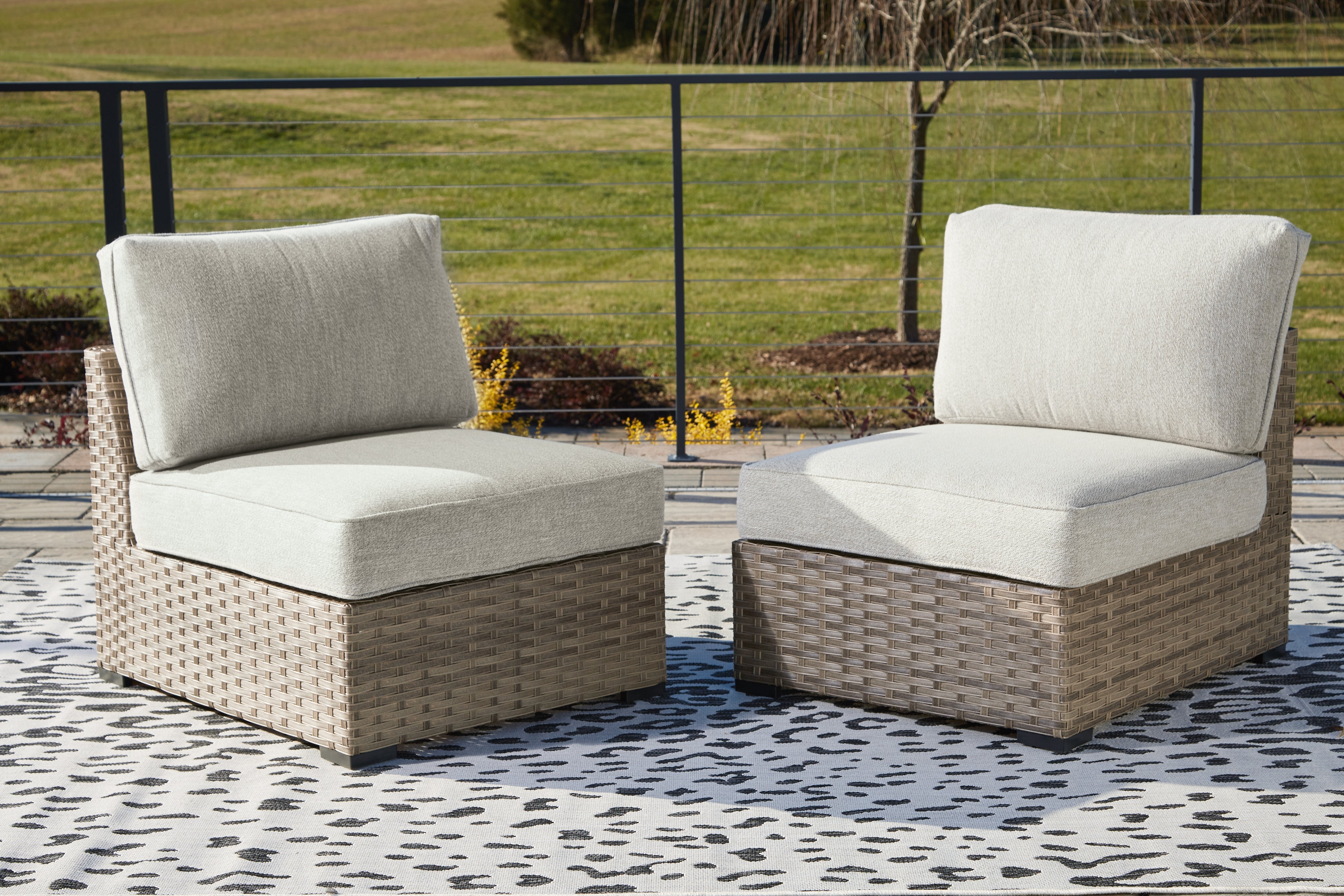 Floridian Furniture - Ashley Furniture - Calworth Outdoor - Armless Chair w/Cushion (Set of 2) / Beige - P458-846