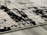 Floridian Furniture - Ashley Furniture - Zekeman Rug - 5'3" x 7'7" Rug / Black/Cream/Gray - R404922