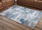 Floridian Furniture - Ashley Furniture - Garyard Rug - 5' x 7' Washable Rug / Multi - R405772