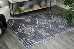 Floridian Furniture - Ashley Furniture - Arloman Rug - 5' x 7' Washable Rug / Black/Cream/Gray - R405932