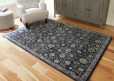 Floridian Furniture - Ashley Furniture - Hilcott Rug - 5'3" x 7'3" Rug / Blue/Cream/Brown - R406112