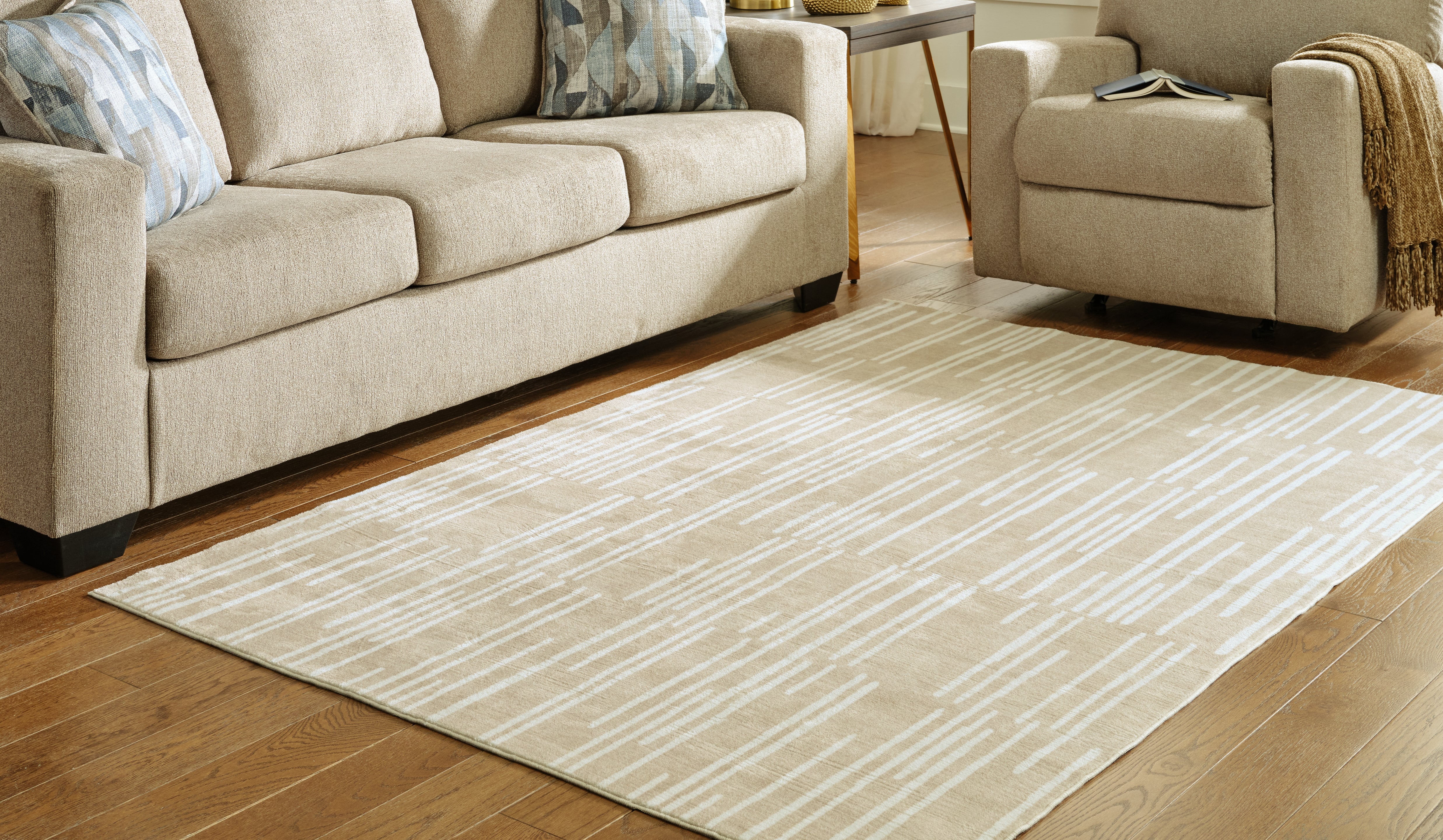 Floridian Furniture - Ashley Furniture - Ardenville Rug - 5' x 7'1" Washable Rug / Tan/Cream - R406212