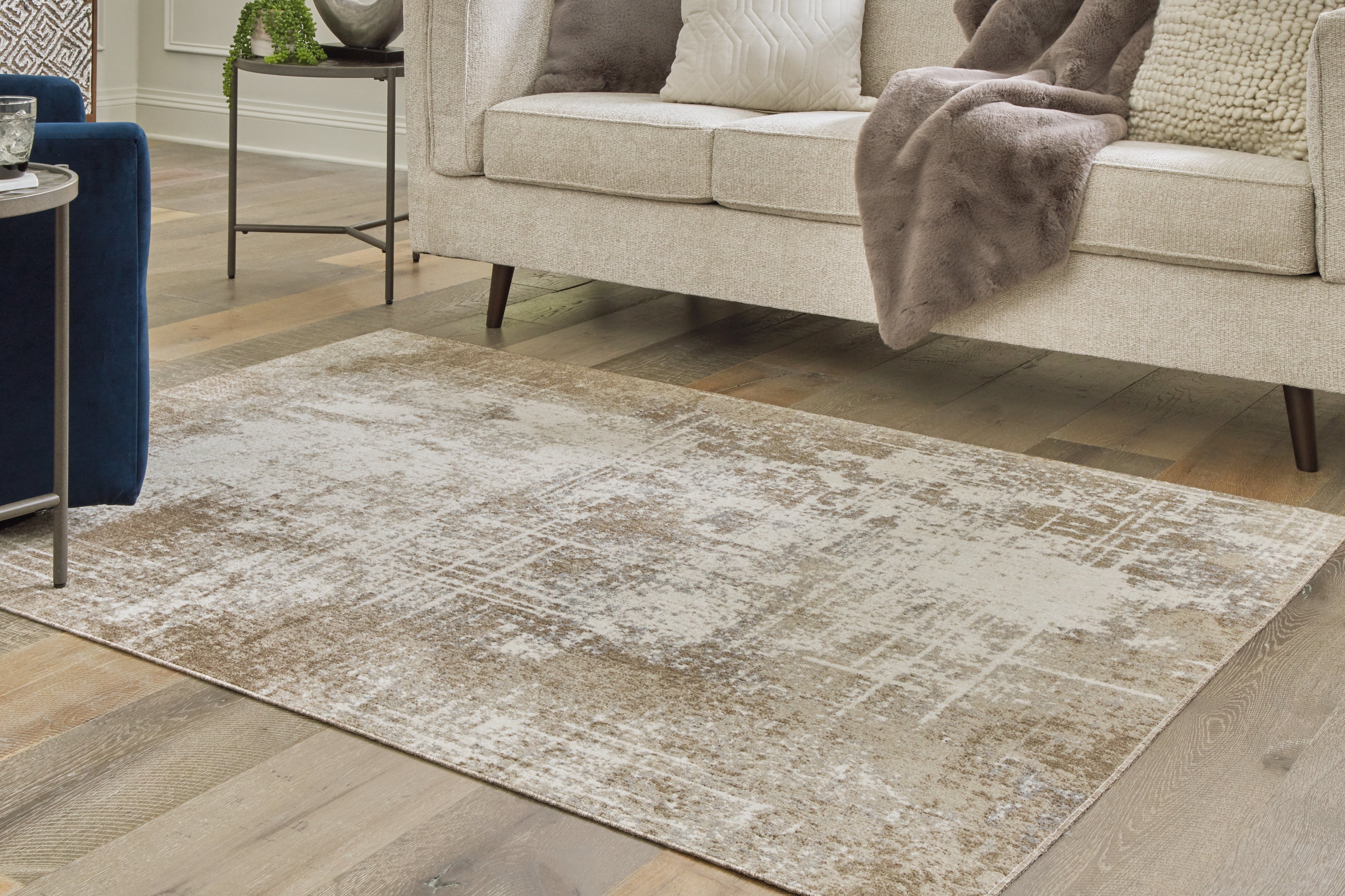 Floridian Furniture - Ashley Furniture - Grifflain Rug - 5'1" x 7' Washable Rug / Tan/Brown/Gray - R406232