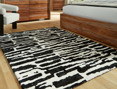 Floridian Furniture - Ashley Furniture - Bramshaw Rug - 5' x 7' Rug / Black/Ivory - R406762