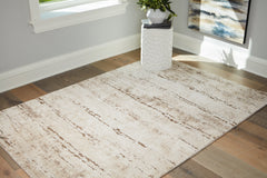 Floridian Furniture - Ashley Furniture - Kasney Rug - 5' x 7' Rug / Cream/Brown - R406852
