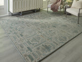 Floridian Furniture - Ashley Furniture - Jossland Rug - 8' x 10' Rug / Green/Ivory - R406911