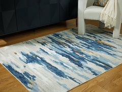 Floridian Furniture - Ashley Furniture - Vinlett Rug - 5' x 7' Washable Rug / Cream/Blue/Brown - R407042