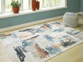 Floridian Furniture - Ashley Furniture - Hessland Rug - 8' x 10' Washable Rug / Multi - R407051