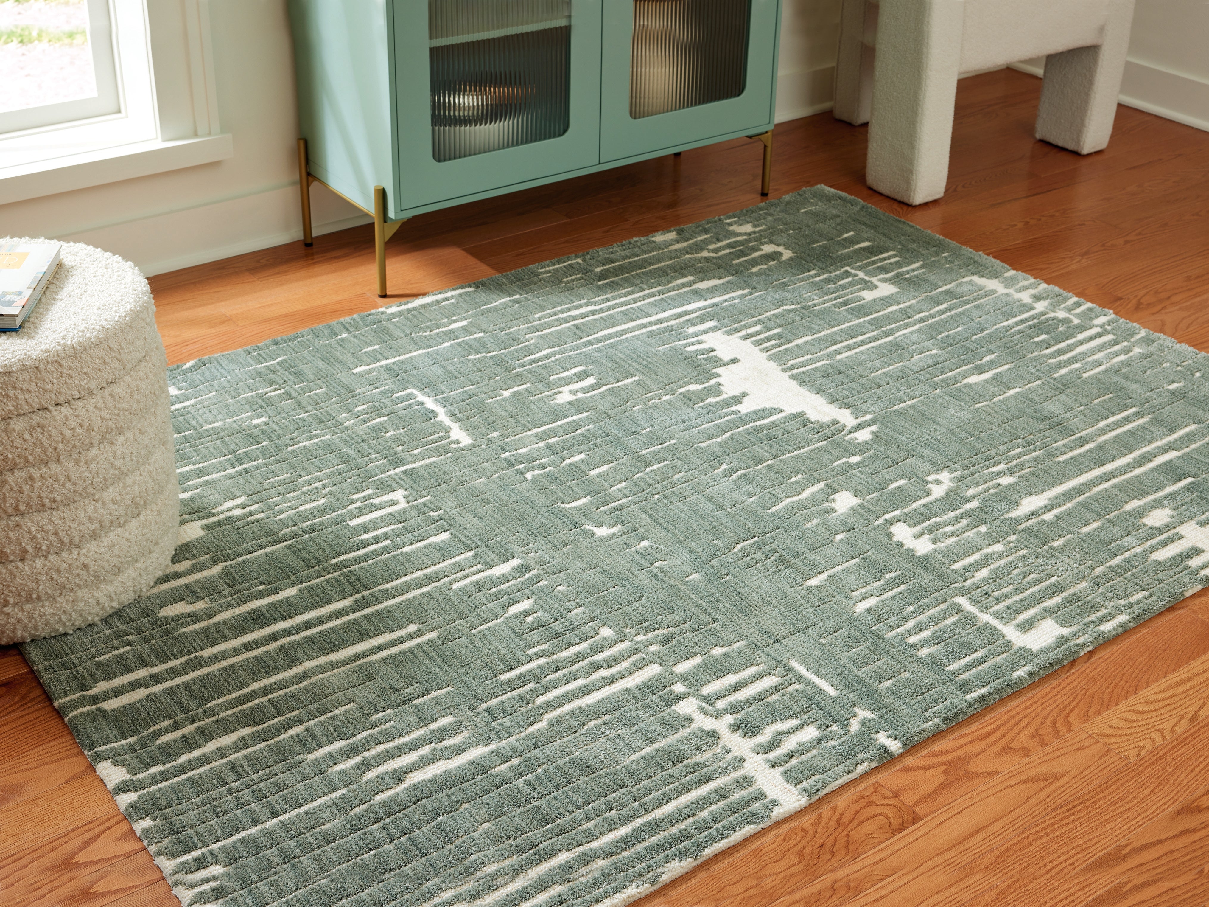 Floridian Furniture - Ashley Furniture - Cayworth Rug - 5' x 7' Rug / Teal/White - R407092