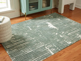 Floridian Furniture - Ashley Furniture - Cayworth Rug - 5' x 7' Rug / Teal/White - R407092