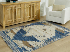 Floridian Furniture - Ashley Furniture - Varnler Rug - 5' x 7' Rug / Blue/Brown/Tan - R407132