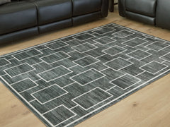 Floridian Furniture - Ashley Furniture - Elderland Rug - Washable 5' x 7' Area Rug / Black/Gray - R407402