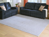 Floridian Furniture - Ashley Furniture - Worthley Rug - Washable 5' x 7' Area Rug / Gray - R407452