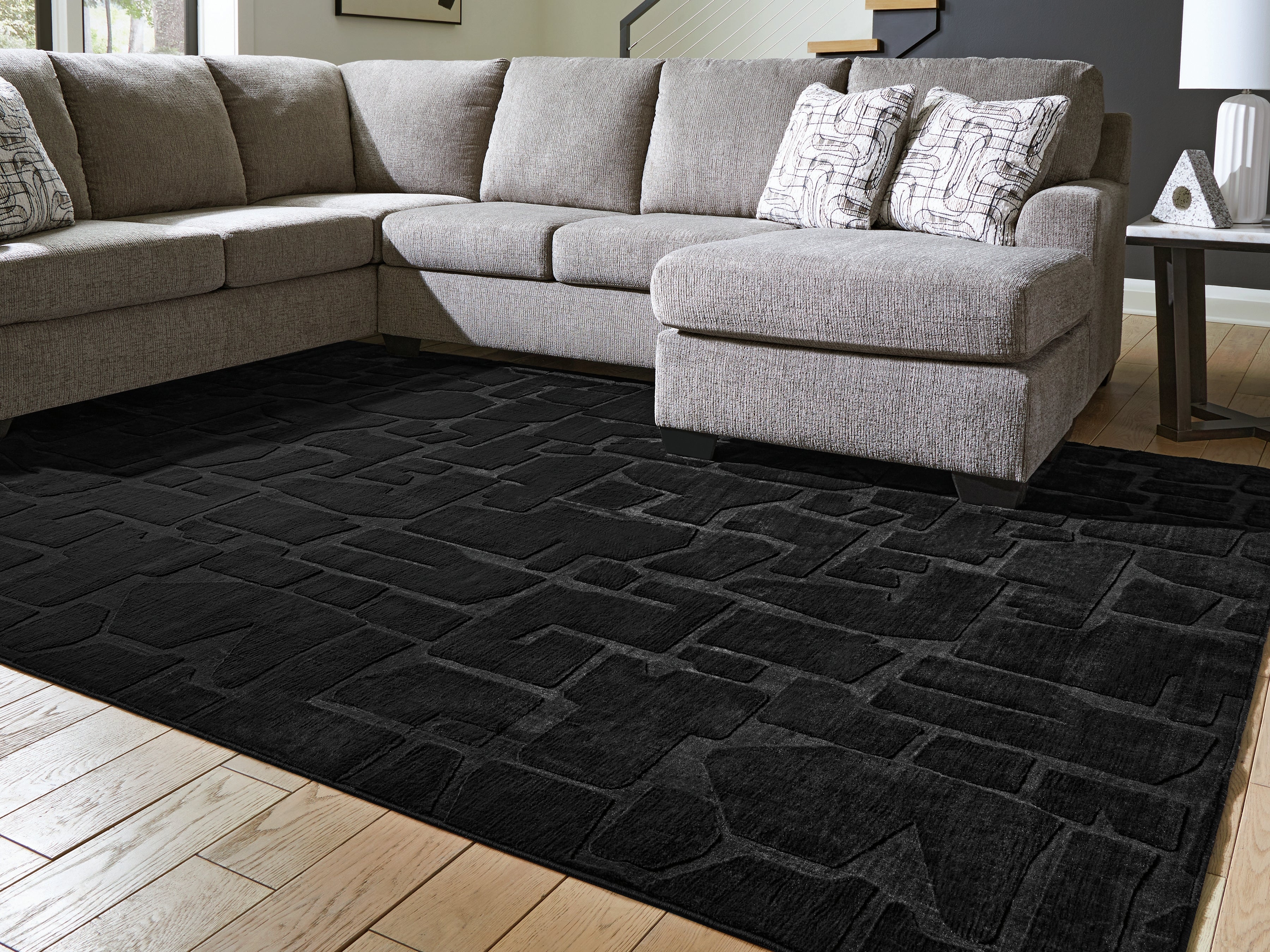 Floridian Furniture - Ashley Furniture - Gibbswell Rug - Washable 5' x 7' Area Rug / Black - R407462