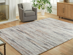 Floridian Furniture - Ashley Furniture - Nace Rug - 5' x 7' Area Rug / Gray/Brown/White - R407472