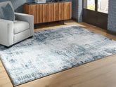 Floridian Furniture - Ashley Furniture - Arlenmont Rug - 5' x 7' Area Rug / Blue/White/Brown - R407482