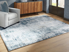 Floridian Furniture - Ashley Furniture - Arlenmont Rug - 5' x 7' Area Rug / Blue/White/Brown - R407482