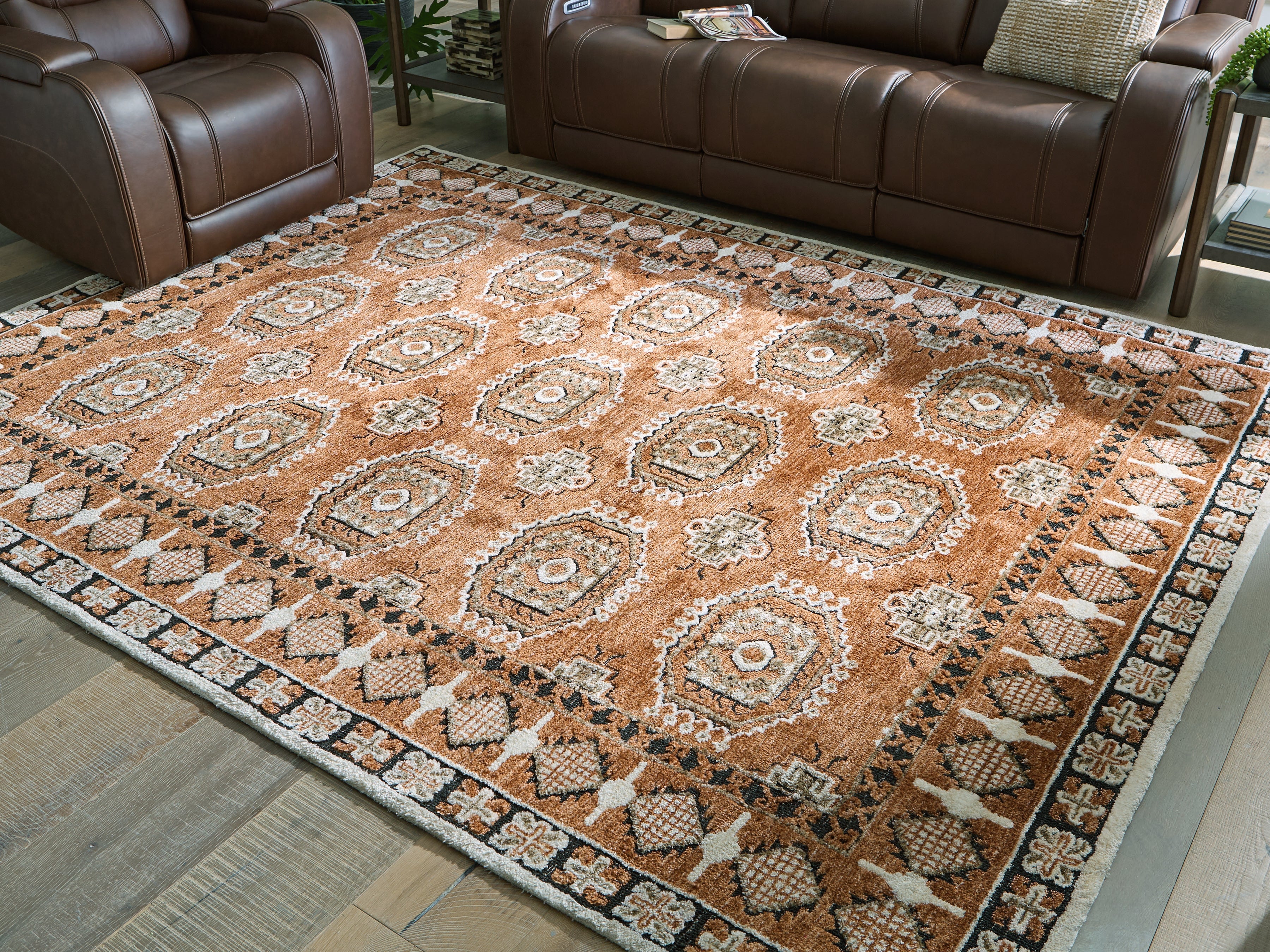 Floridian Furniture - Ashley Furniture - Qaabiz Rug - 7'8" x 10' Area Rug / Sienna/Ivory/Black - R407521