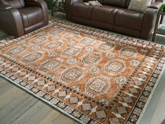 Floridian Furniture - Ashley Furniture - Qaabiz Rug - 7'8" x 10' Area Rug / Sienna/Ivory/Black - R407521