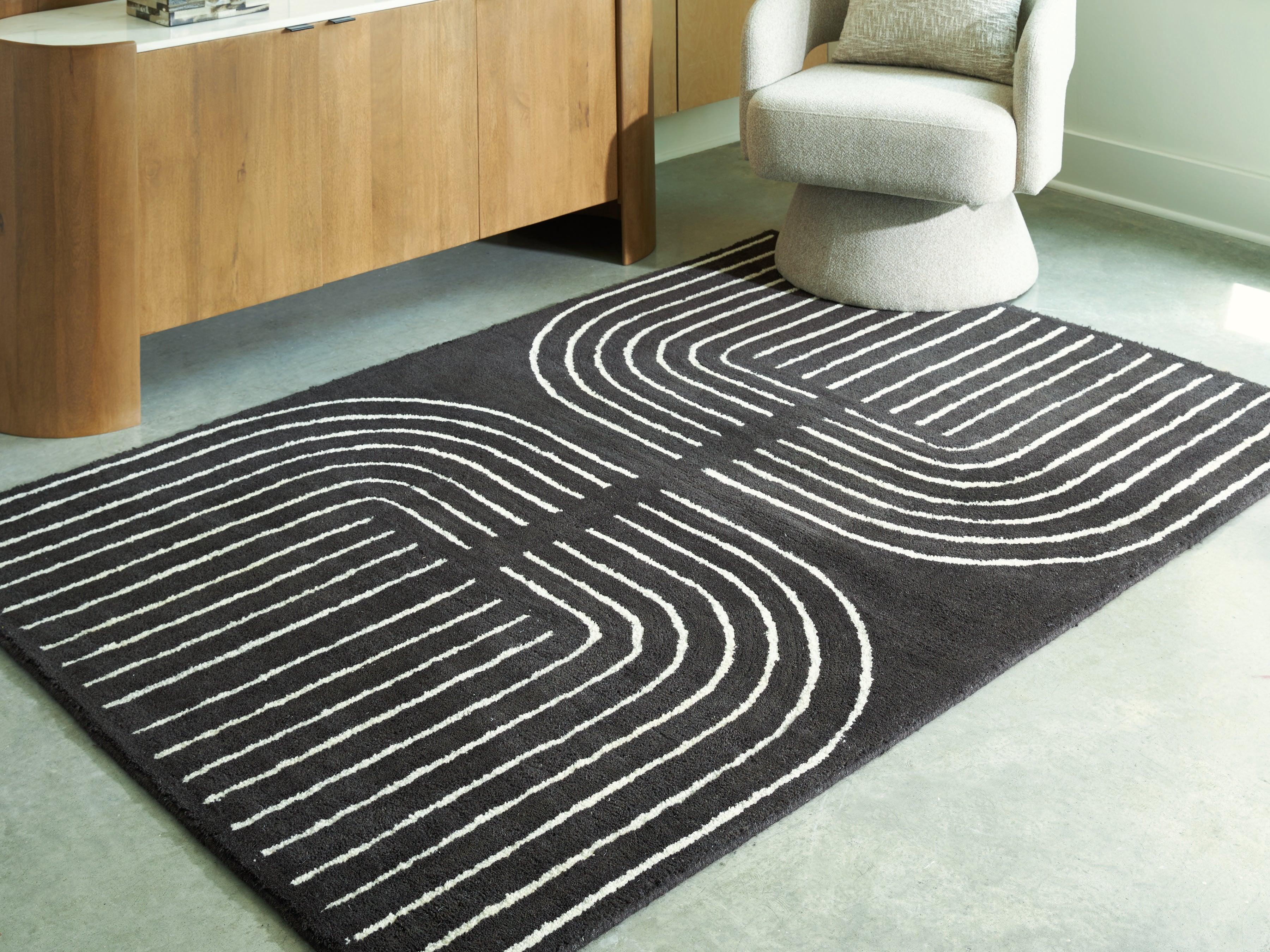 Floridian Furniture - Ashley Furniture - Eldonmore Rug - 5' x 7' Area Rug / Black/Ivory - R407572