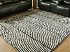 Floridian Furniture - Ashley Furniture - Kurtmen Rug - 7'10" x 9'10" Area Rug / Black/Ivory - R407591