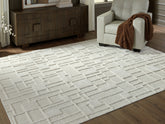 Floridian Furniture - Ashley Furniture - Empriss Rug - 7'8" x 10' Area Rug / Ivory - R407621