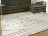 Floridian Furniture - Ashley Furniture - Farongrove Rug - 7'10" x 10' Area Rug / Ivory/Beige - R407671