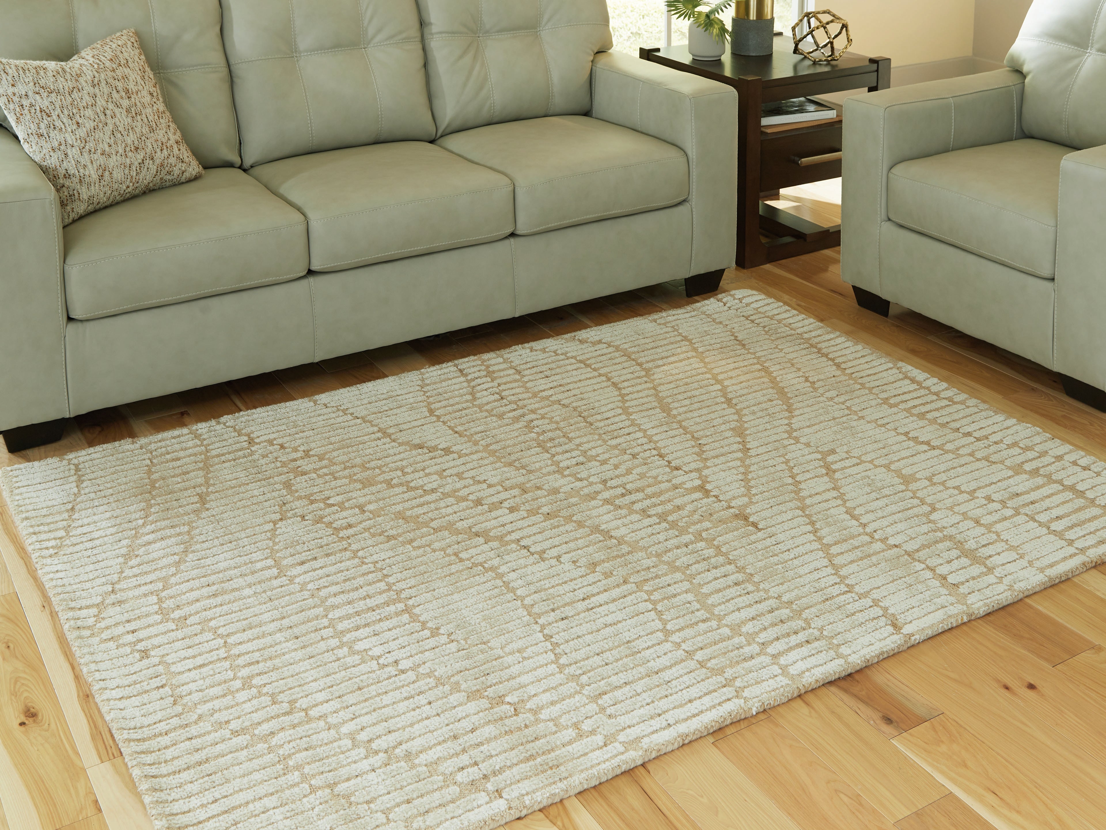 Floridian Furniture - Ashley Furniture - Jaseena Rug - 5' x 7' Area Rug / Beige/Tan - R407722