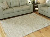 Floridian Furniture - Ashley Furniture - Jaseena Rug - 5' x 7' Area Rug / Beige/Tan - R407722
