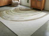 Floridian Furniture - Ashley Furniture - Rizwana Rug - 7'6" x 10' Area Rug / Ivory/Brown/Gray - R407761