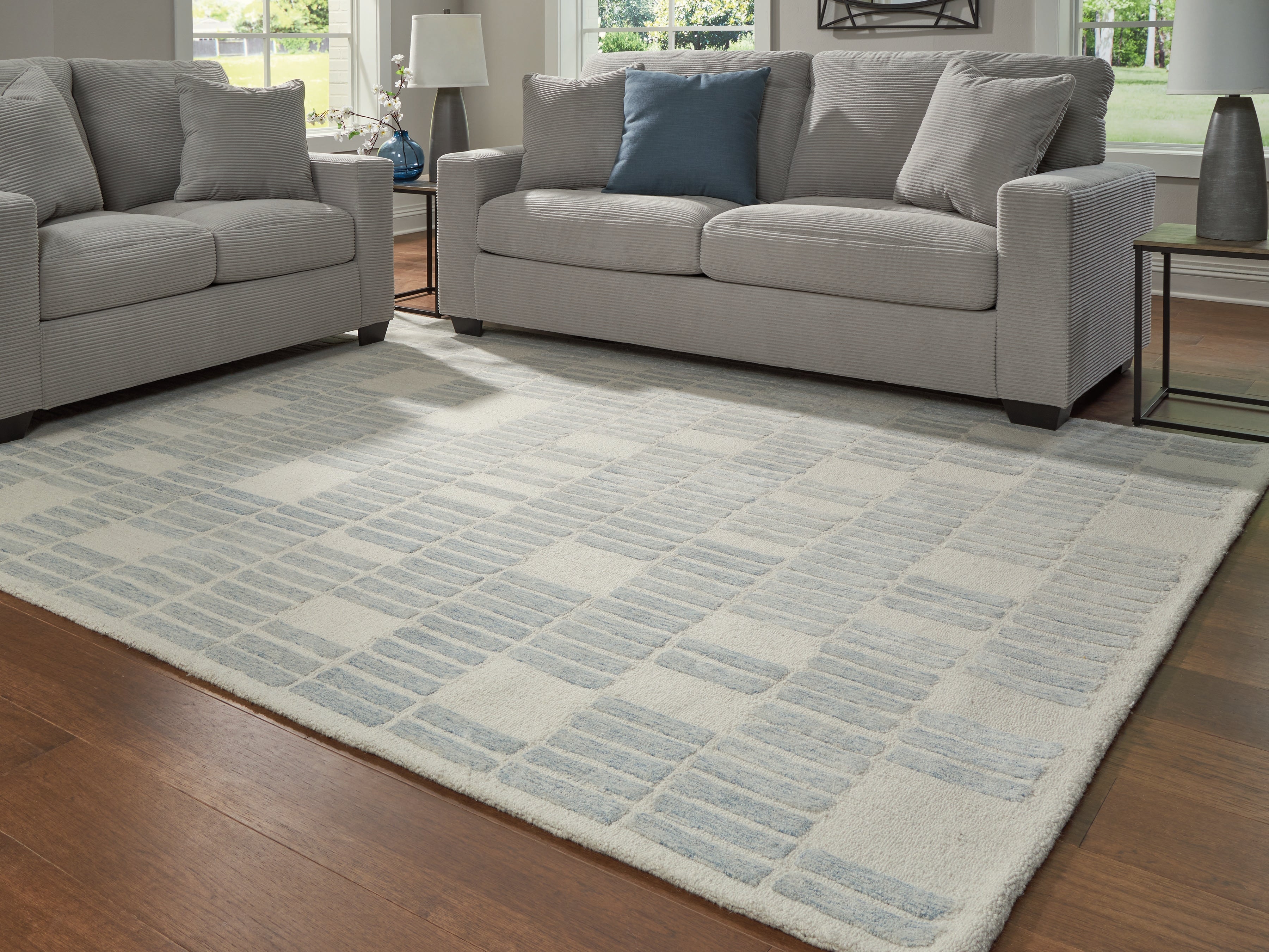 Floridian Furniture - Ashley Furniture - Dylanton Rug - 7'8" x 10' Area Rug / Ivory/Blue - R407811
