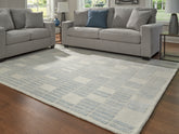 Floridian Furniture - Ashley Furniture - Dylanton Rug - 7'8" x 10' Area Rug / Ivory/Blue - R407811