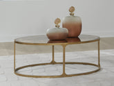 Floridian Furniture - Ashley Furniture - Korajane Coffee Table - Oval Cocktail Table / Antique Gold - T399-0