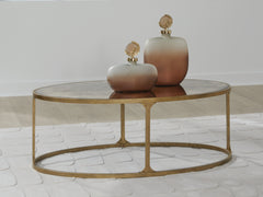 Floridian Furniture - Ashley Furniture - Korajane Coffee Table - Oval Cocktail Table / Antique Gold - T399-0