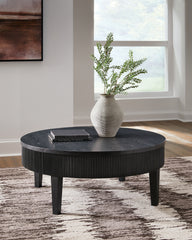 Floridian Furniture - Ashley Furniture - Marstream Coffee Table - Round Cocktail Table / Black - T551-8