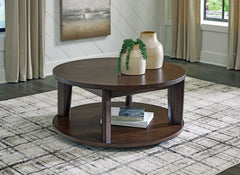 Floridian Furniture - Ashley Furniture - Korestone 2 Coffee Table - Round Cocktail Table / Dark Brown - T657-8