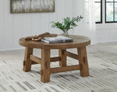 Floridian Furniture - Ashley Furniture - Mackifeld Coffee Table - Round Cocktail Table / Warm Brown - T724-8