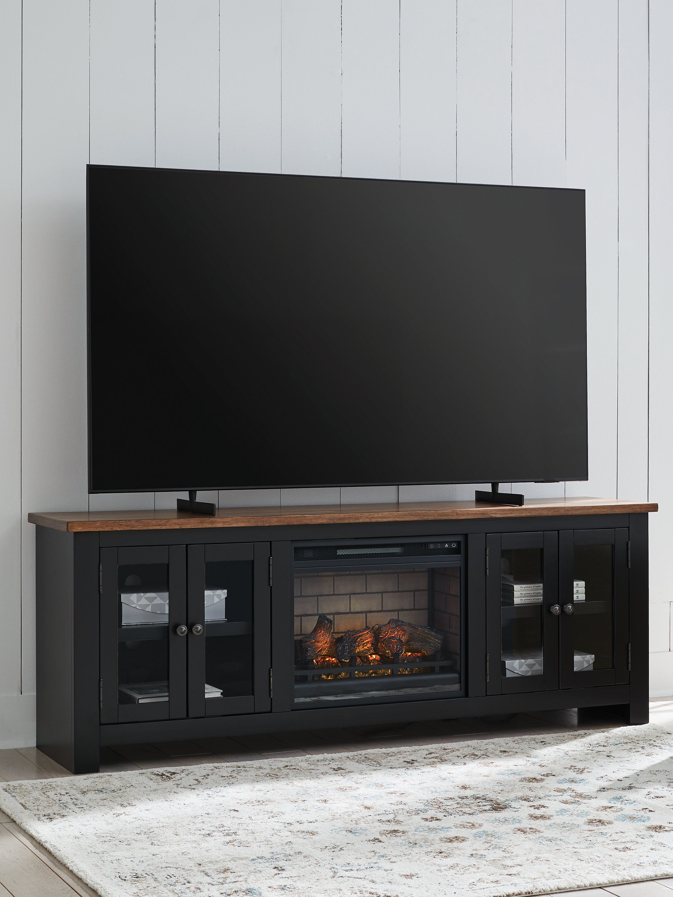 Floridian Furniture - Ashley Furniture - Wildenauer 76" TV Stand with Electric Fireplace - 76" TV Stand with Electric Fireplace / Brown/Black - W664W1