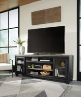 Floridian Furniture - Ashley Furniture - Foyland 83" TV Stand - 83" / Black/Brown - W989-68