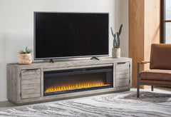 Floridian Furniture - Ashley Furniture - Naydell 92" TV Stand with Electric Fireplace - 92" TV Stand with Electric Fireplace / Gray - W996W1