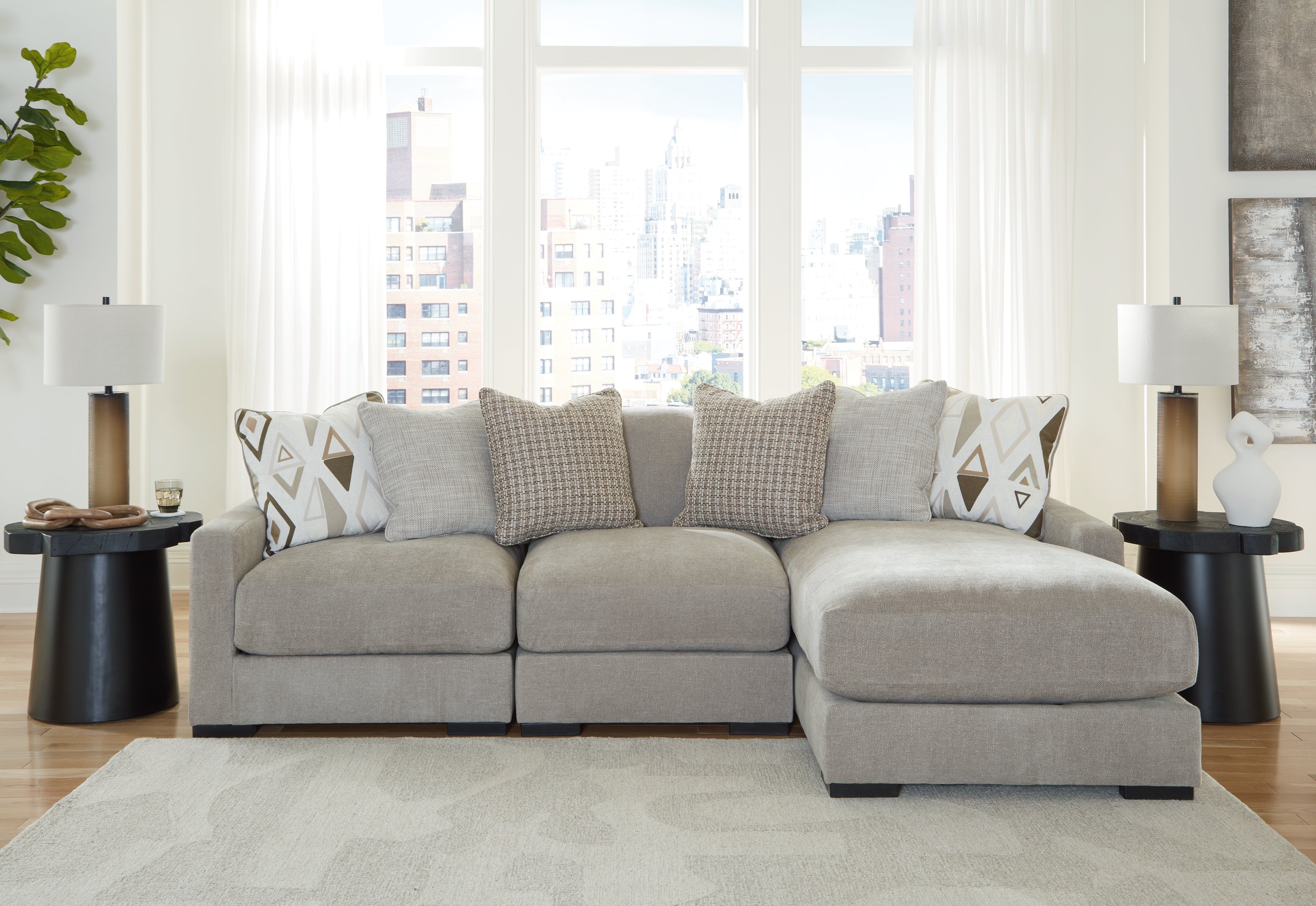Floridian Furniture - Ashley Furniture - Aslan Court Sectional - RAF 3-Piece Sofa Sectional with Chaise / Pebble - 20305S4
