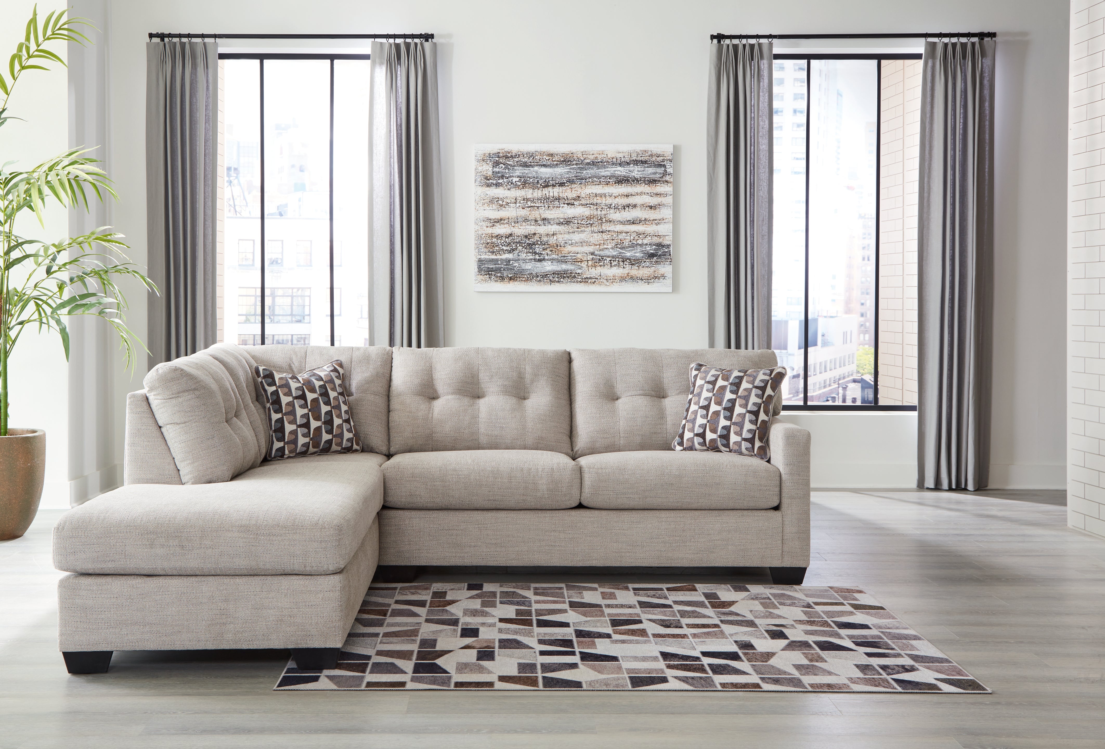 Floridian Furniture - Ashley Furniture - Mahoney Sectional - 2-Piece Sleeper Sectional with Chaise / Chocolate - 31005S4