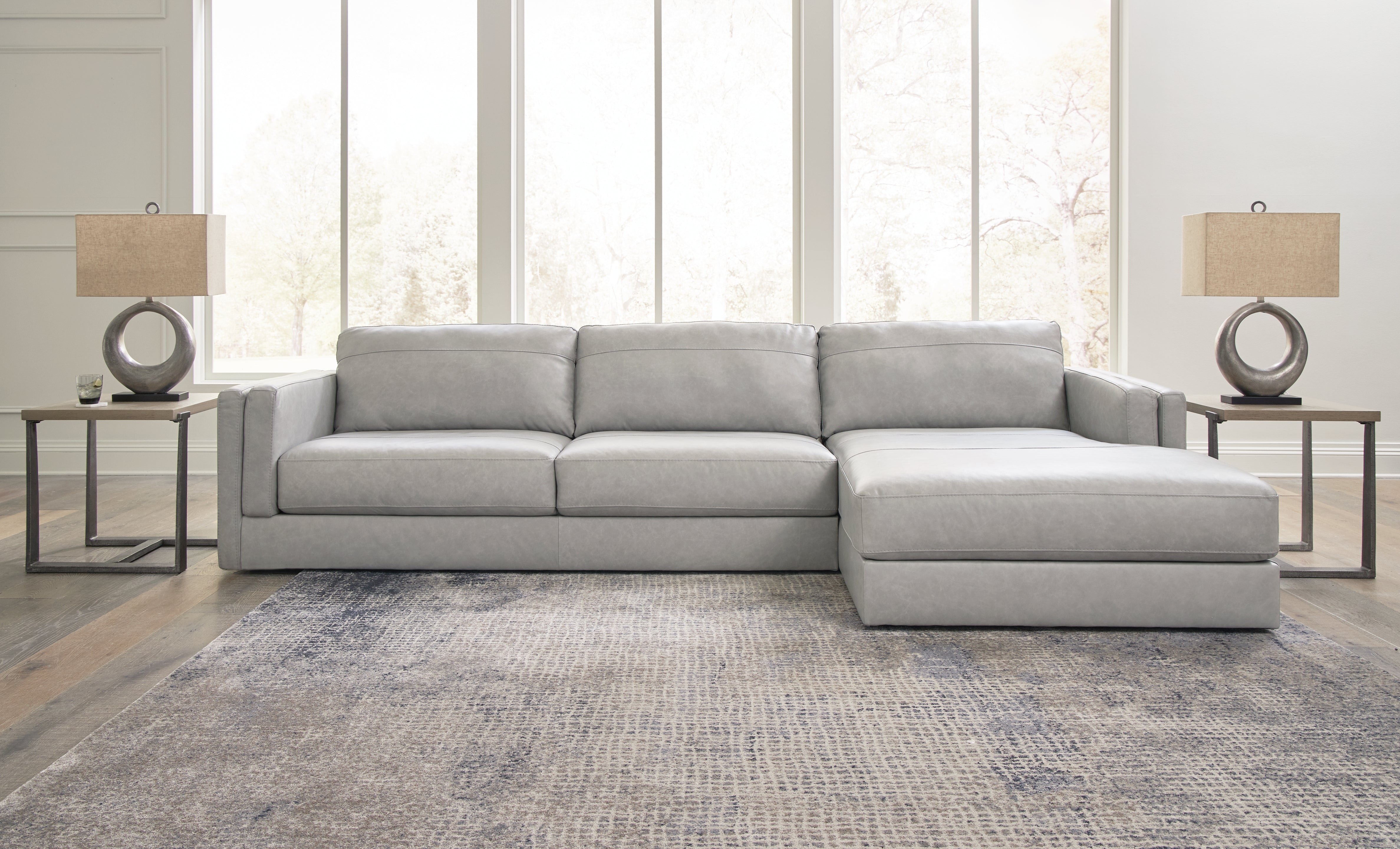 Floridian Furniture - Ashley Furniture - Amiata Sectional - LAF 2-Piece Sectional with Chaise / Glacier - 57404S2