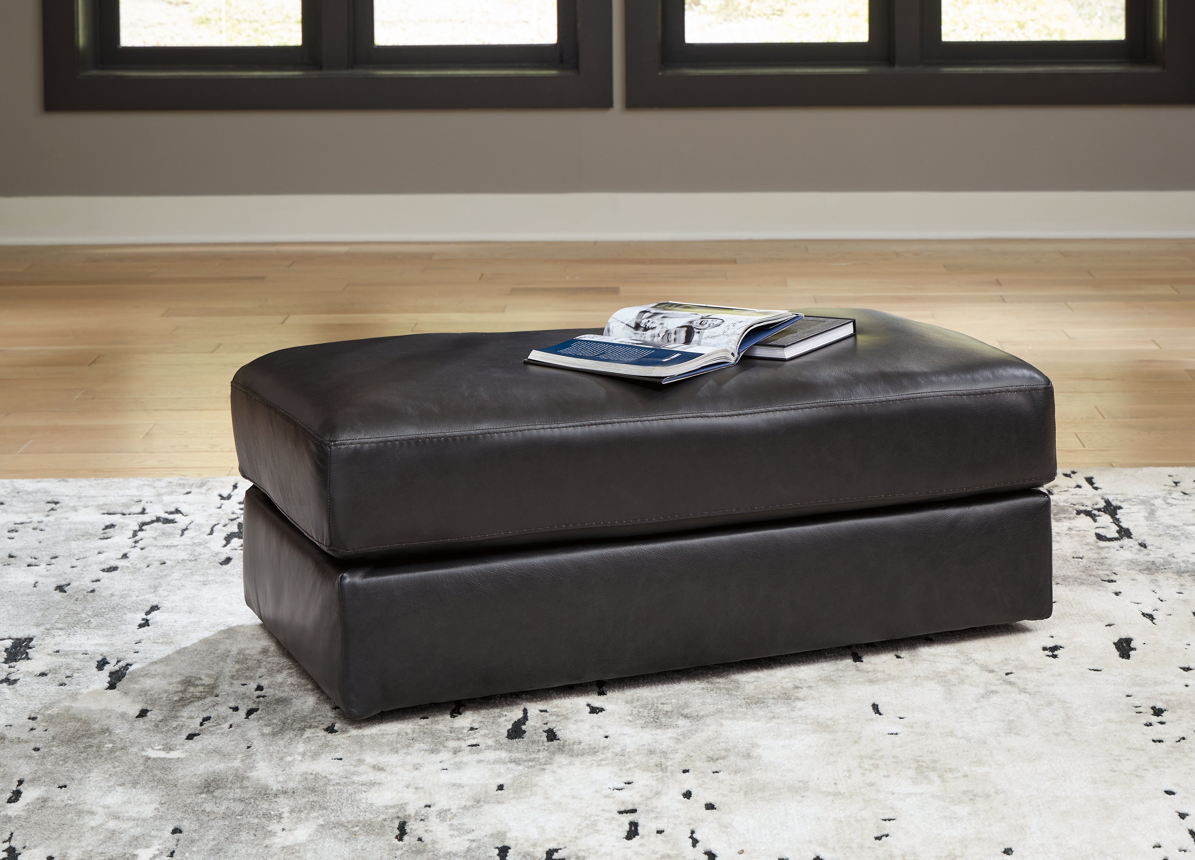 Floridian Furniture - Ashley Furniture - Amiata Living Room - Ottoman / Onyx - 5740514