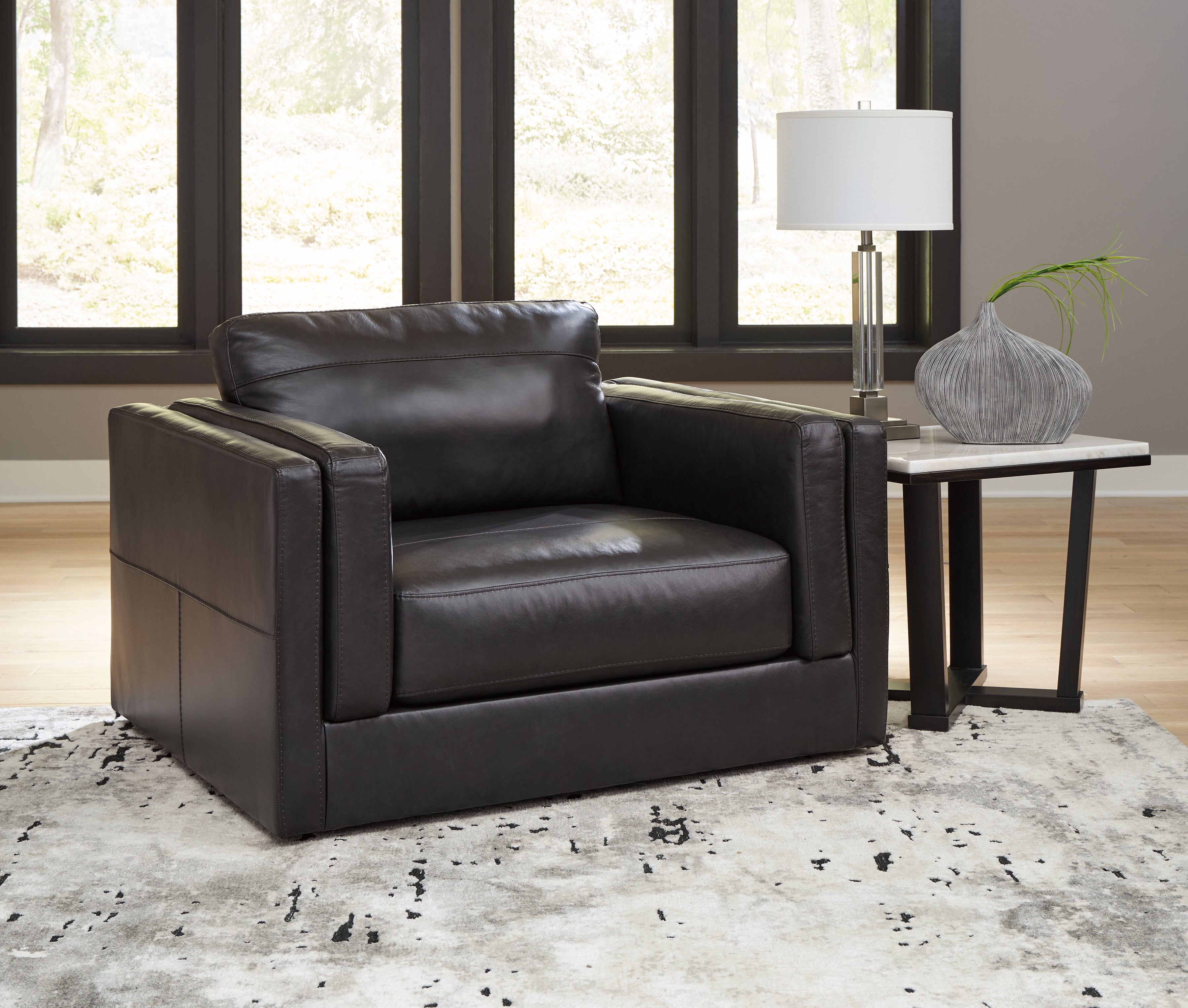 Floridian Furniture - Ashley Furniture - Amiata Living Room - Chair and a Half / Onyx - 5740523