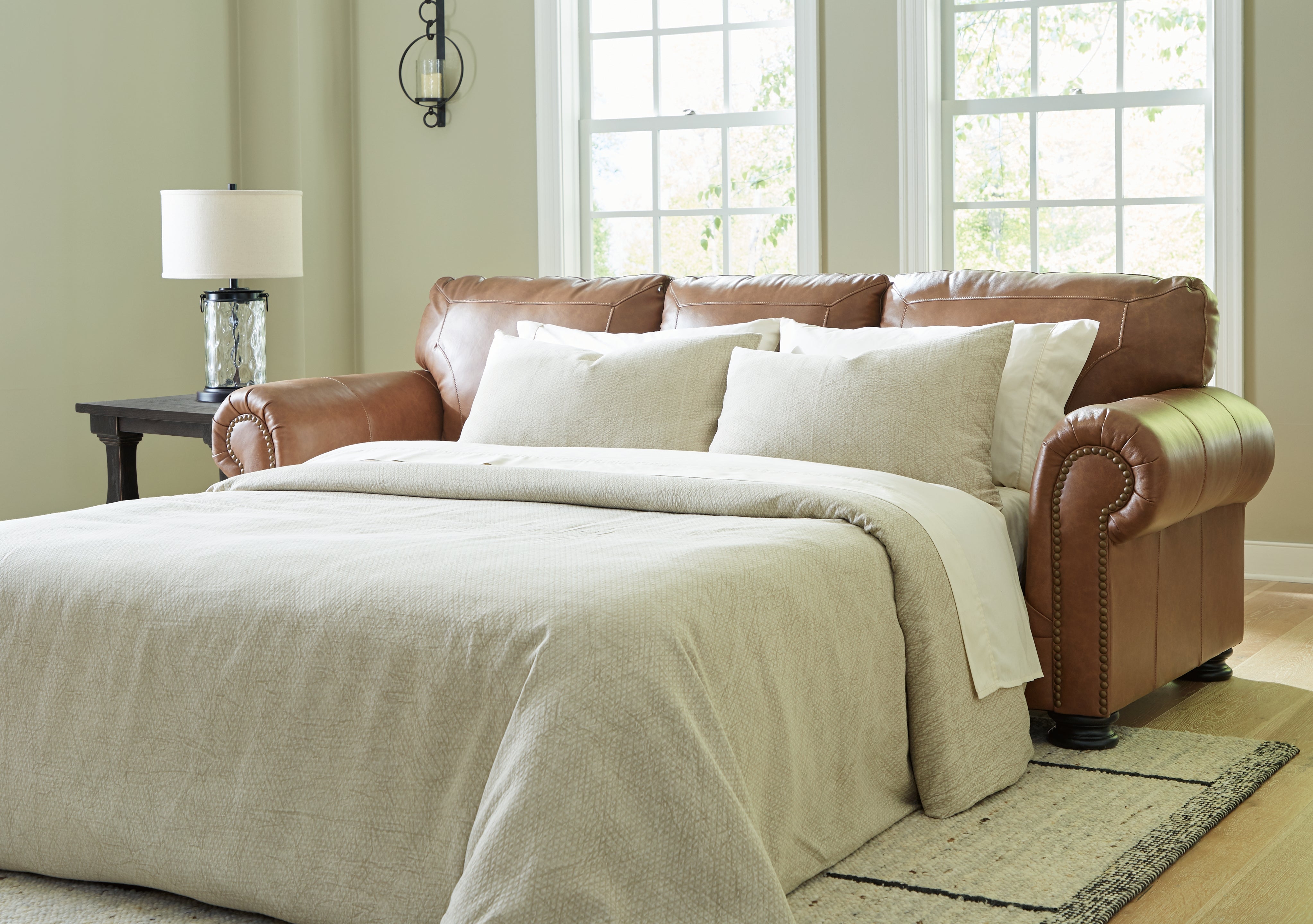 Floridian Furniture - Ashley Furniture - Carianna Living Room - Queen Sofa Sleeper / Caramel - 5760439