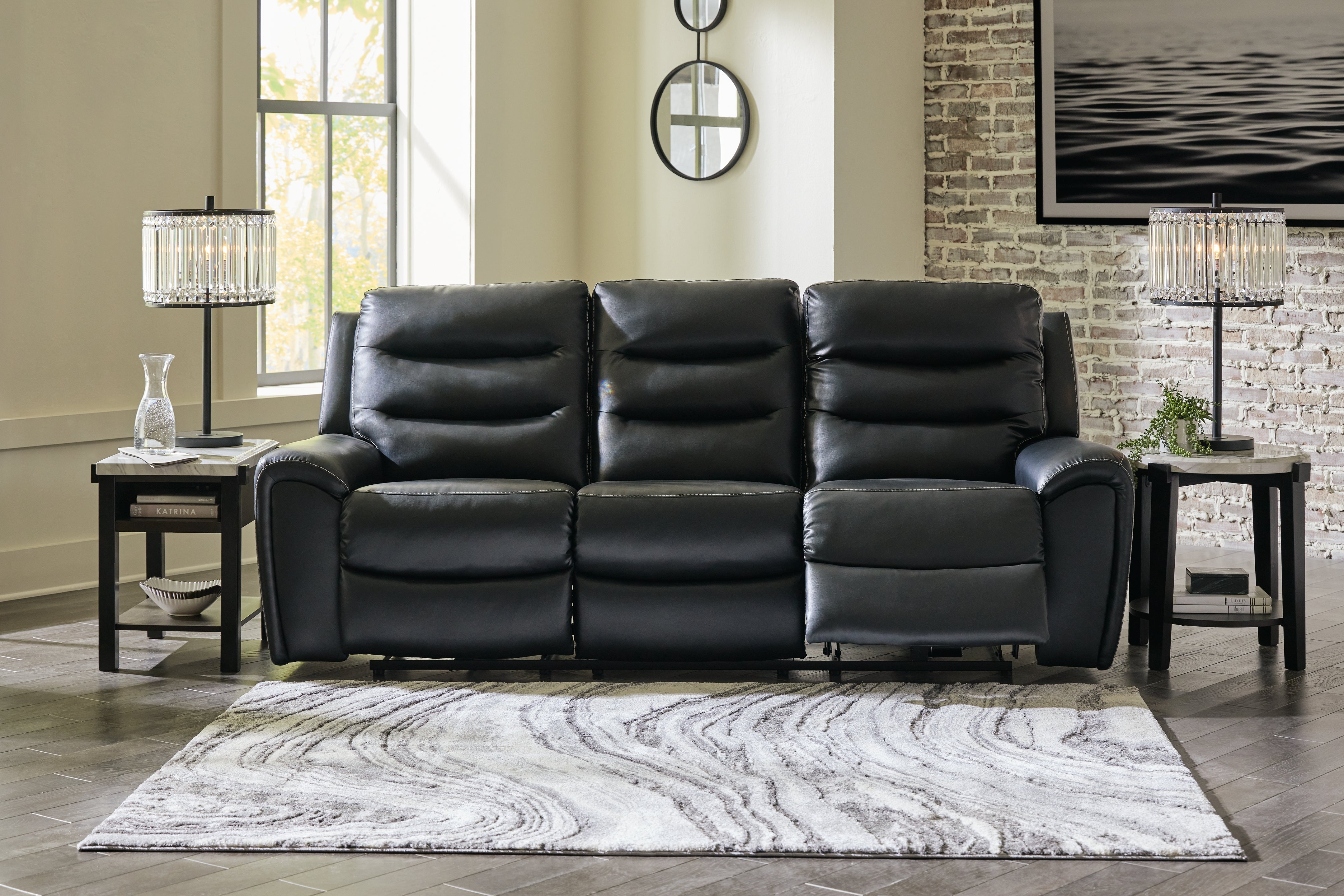 Floridian Furniture - Ashley Furniture - Warlin Living Room - PWR REC Sofa with ADJ Headrest / Black - 6110515