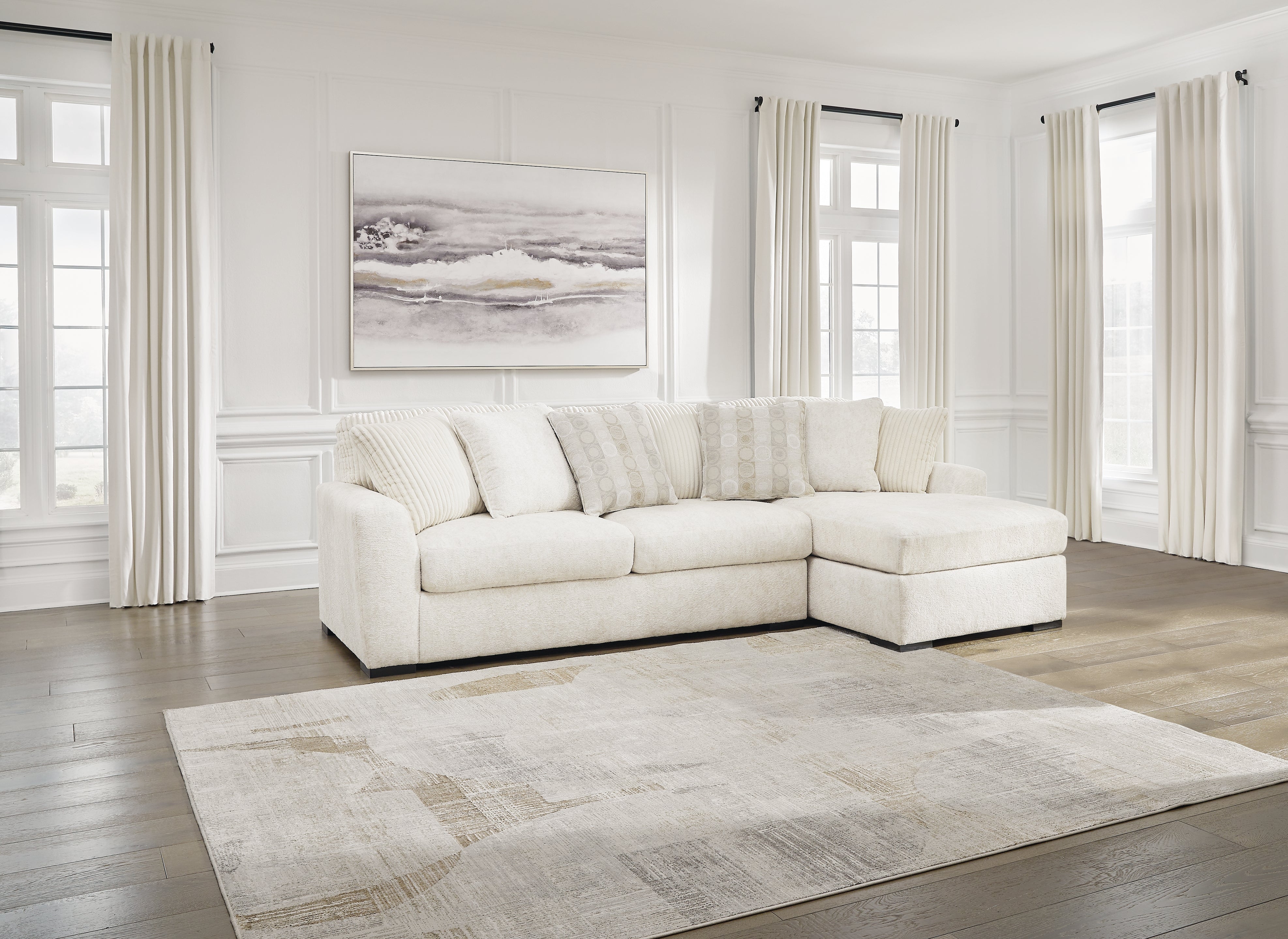 Floridian Furniture - Ashley Furniture - Chessington Sectional - LAF 2-Piece Sectional with Chaise / Ivory - 61904S2