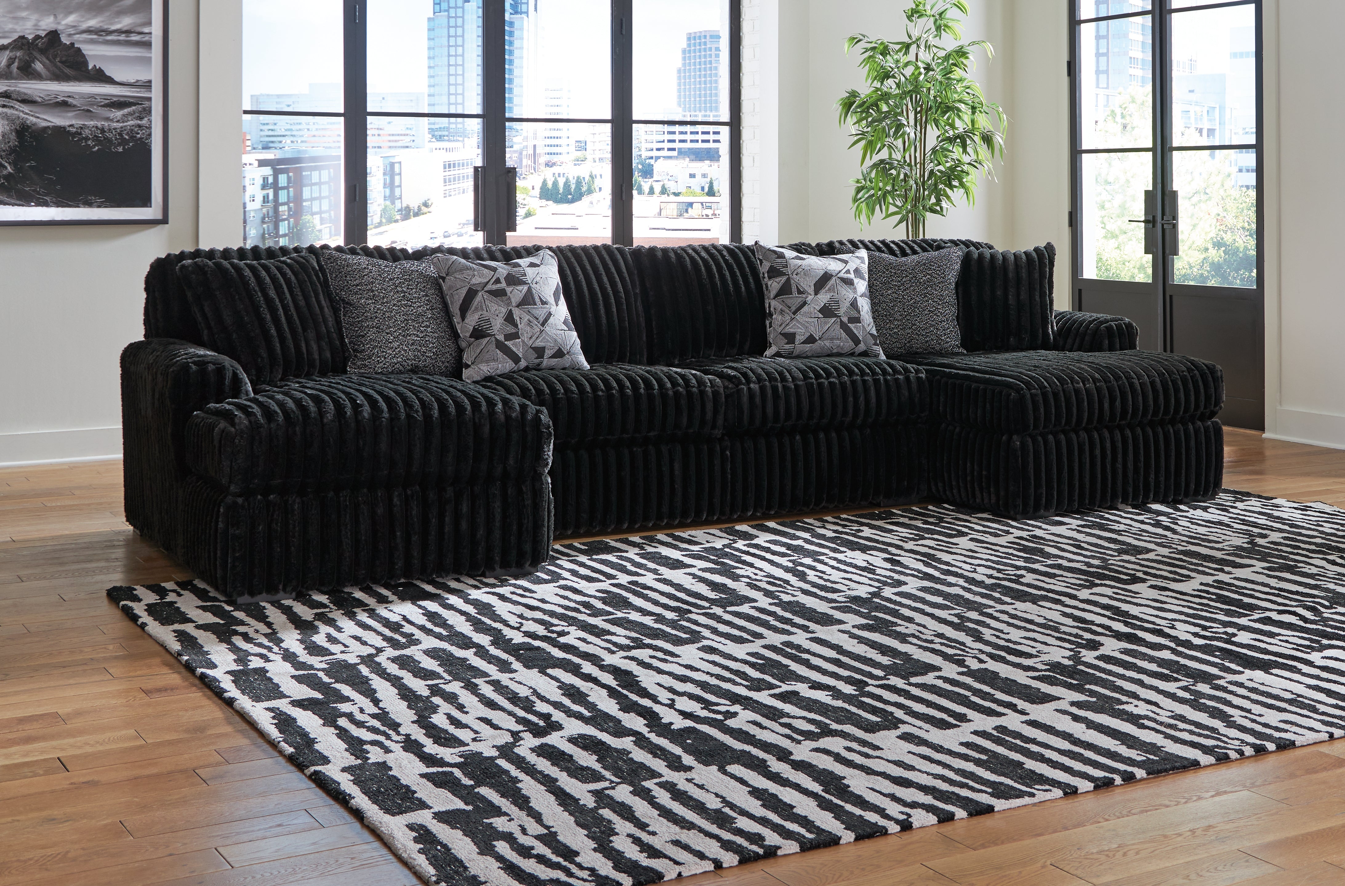 Floridian Furniture - Ashley Furniture - Midnight-Madness Sectional - RAF 3-Piece Sectional with Chaise / Onyx - 98103S5